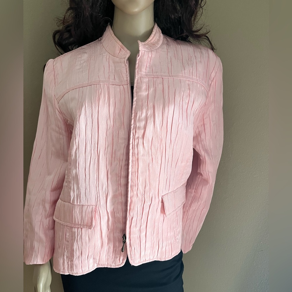 Barely worn beautiful pink jacket with zipper front closure.  Size 14 petite